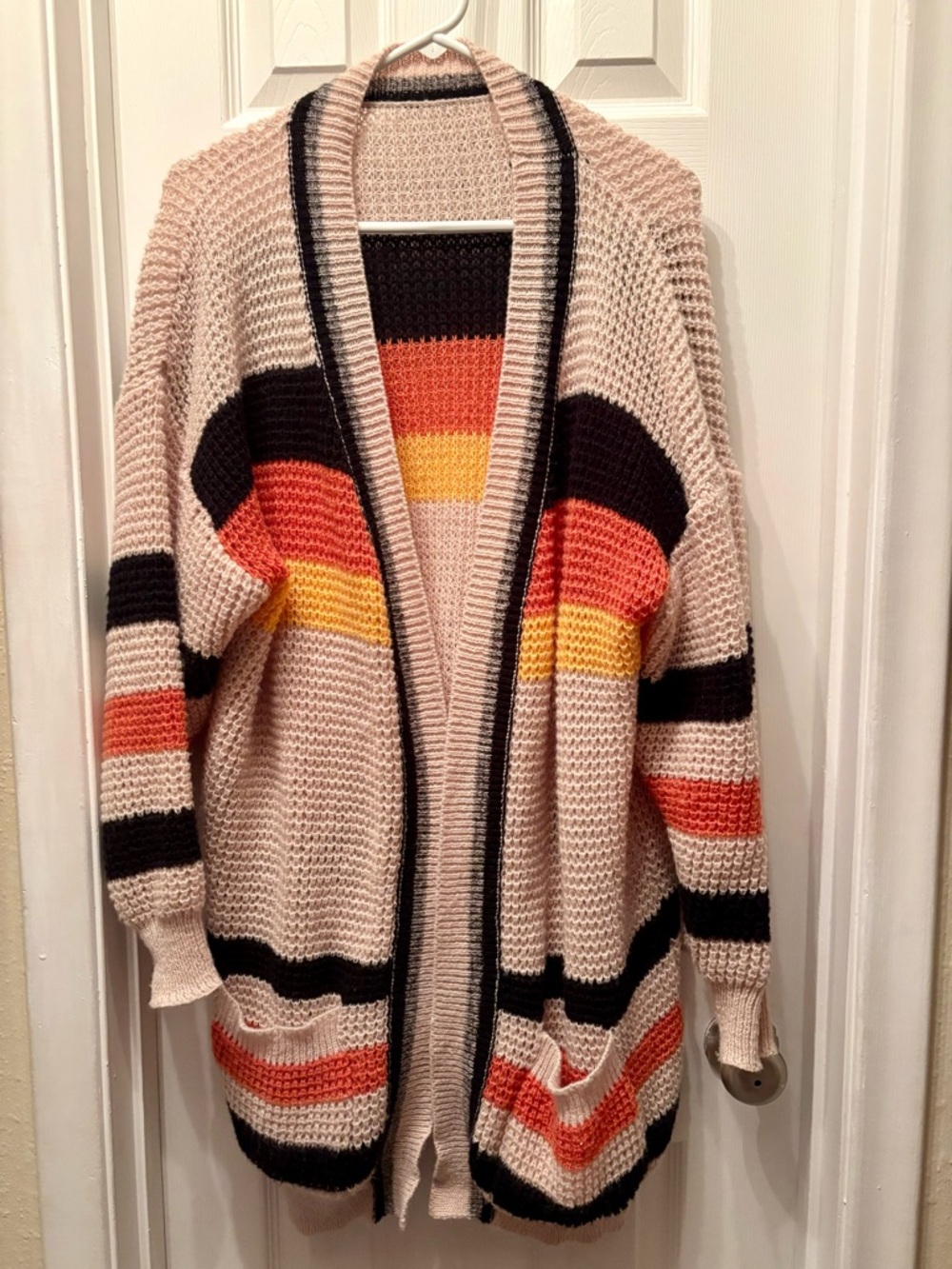 Woman’s stripe cardigan with pockets